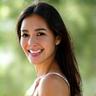 Smiling woman in her late 30s, Sarah L.