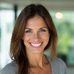 Smiling portrait of Maria Garcia, a dynamic Certified Fitness Trainer.